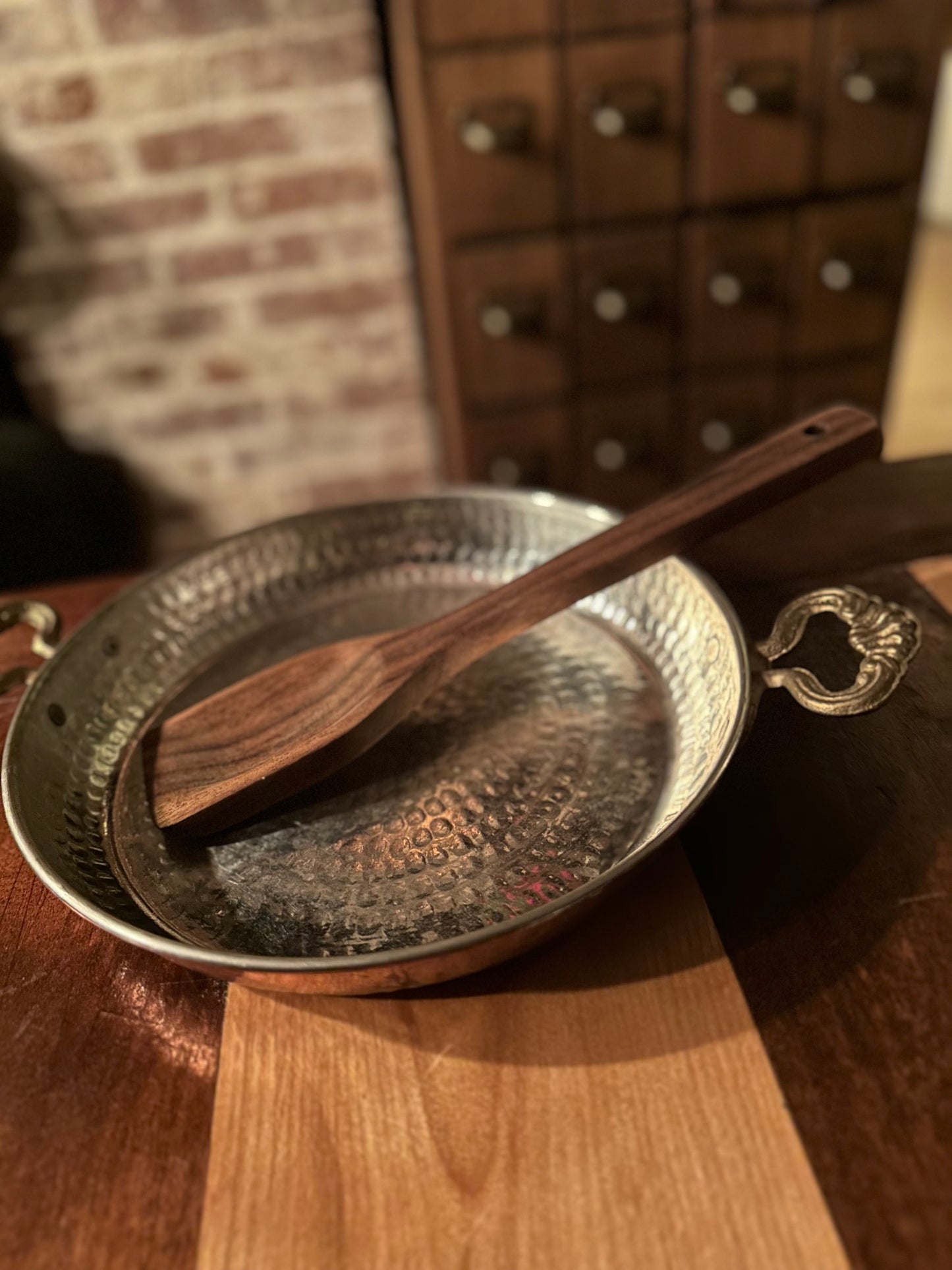 Flat top African walnut spatula hand-carved in Maine