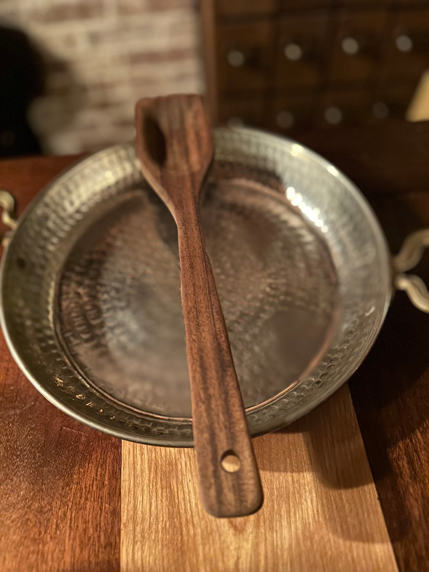 Flat top African walnut spatula hand-carved in Maine