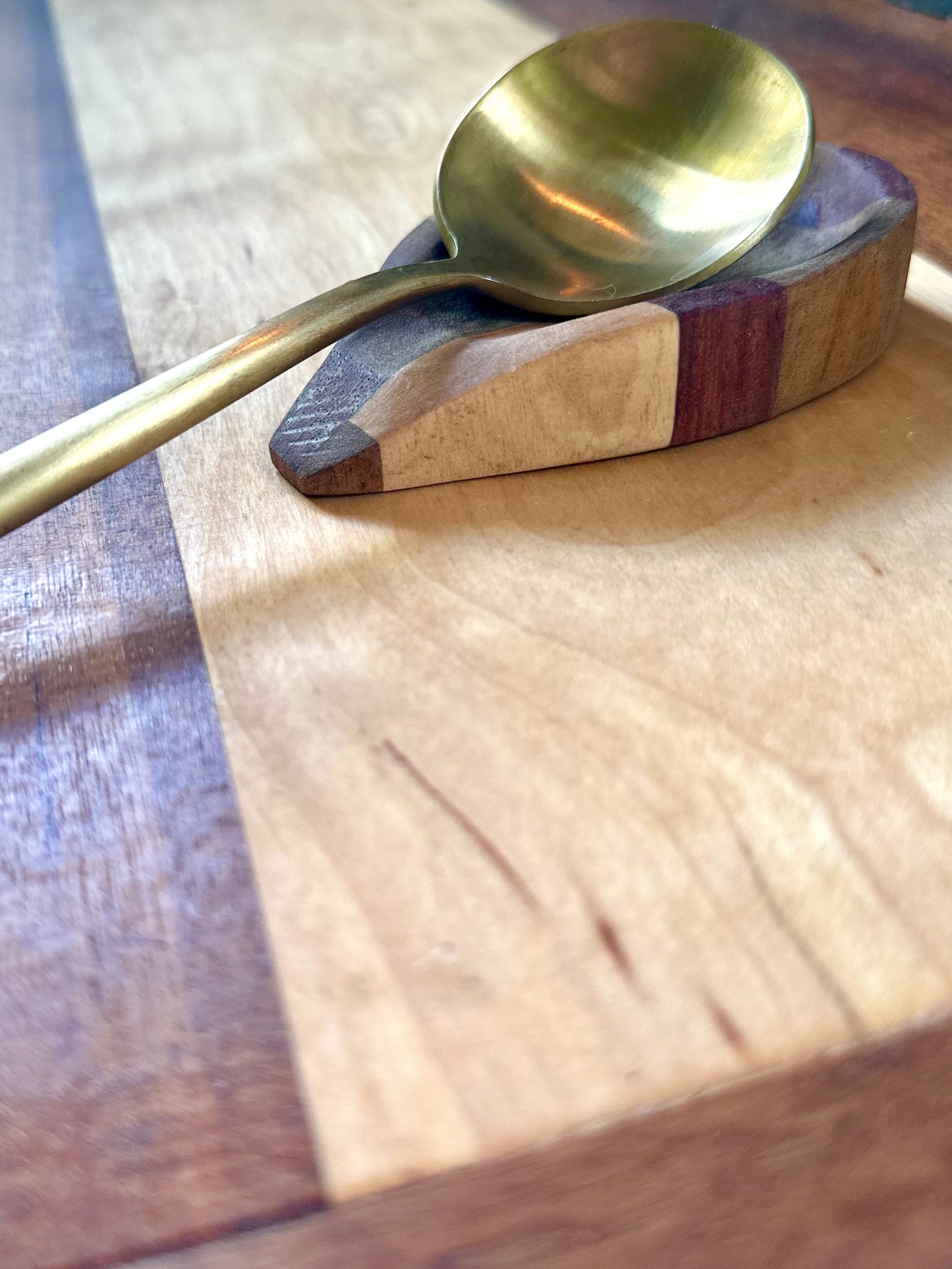 Hand- Carved Coffee Spoon Rest - South African harvested olive wood, African walnut, Maine harvested flame birch, and Brazilian harvested king wood.